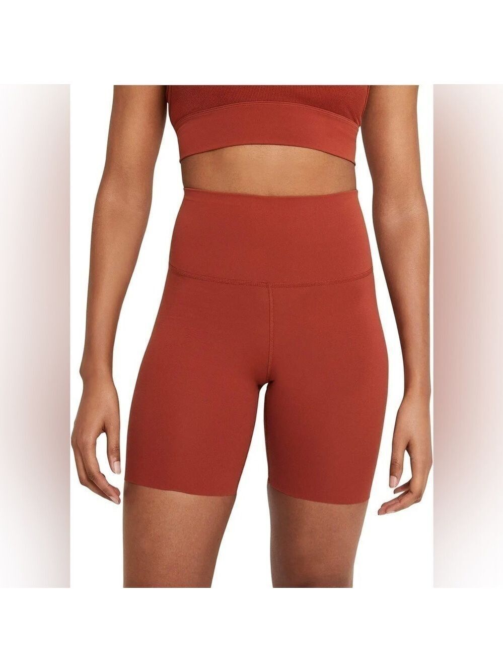 Nike Yoga Lux 7" High Waist Compression Bike Shorts in Rust Orange